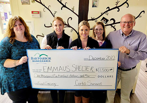 BHBT presents a donation to Emmaus Shelter