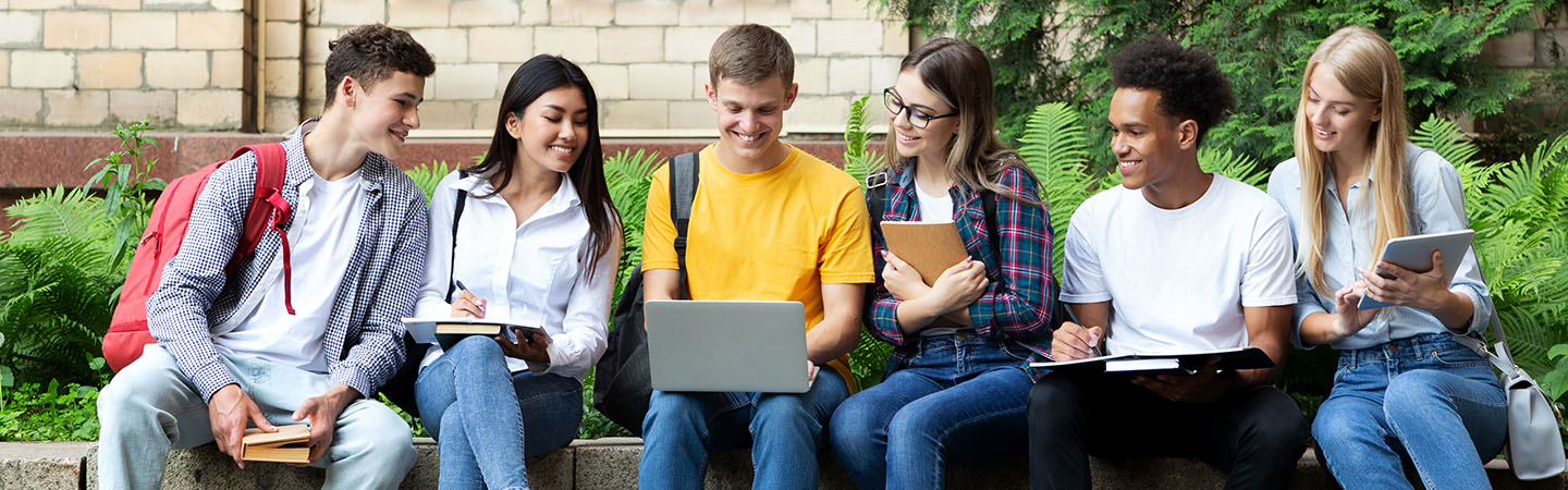 Students looking at a laptop screen