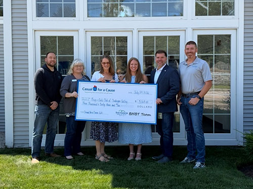 BHBT employees present a donation to Boys & Girls Club of Souhegan Valley