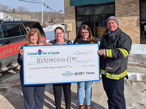 BHBT employees present a donation to Rockland Fire & EMS