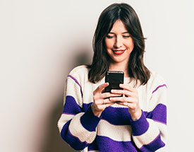 Woman looking at a smartphone