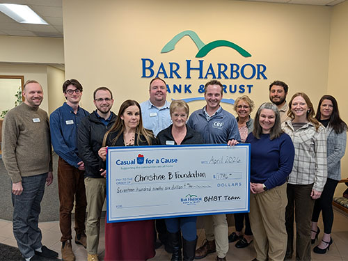 BHBT employees present a donation to Christine B. Foundation
