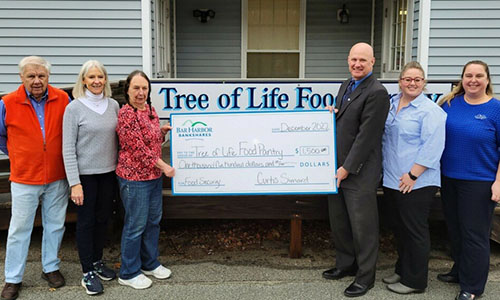 BHBT presents a donation to Tree of Life Food Pantry