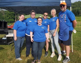 BHBT employees volunteer at an event