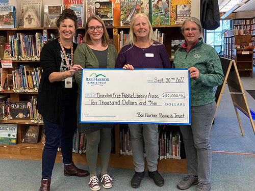 BHBT presents a check to the Brandon Free Public Library