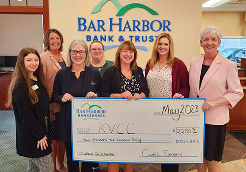 BHBT employees present a donation to Kennebec Valley Community College Foundation