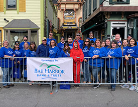 Smiling BHBT employees at an event