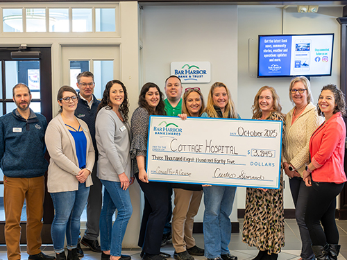 BHBT employees make a donation to Cottage Hospital