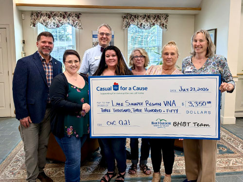 BHBT employees present a donation to Lake Sunapee Region VNA & Hospice