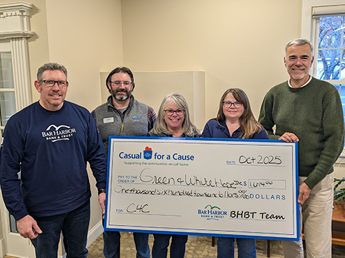 BHBT employees make a donation to Green & White Hope
