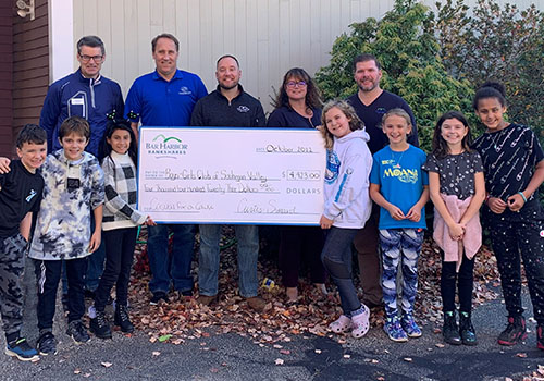 BHBT employees present a check to Boys & Girls Club of Souhegan Valley