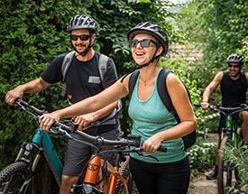 Friends biking in a wooded area
