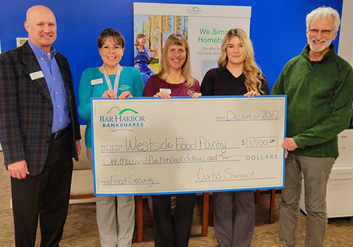 BHBT presents a donation to Westside Food Pantry