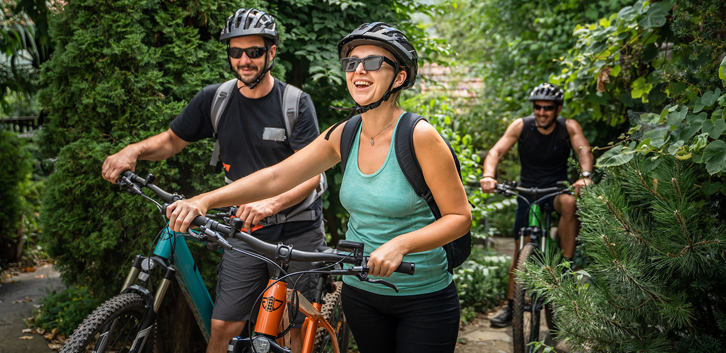 Friends biking in a wooded area