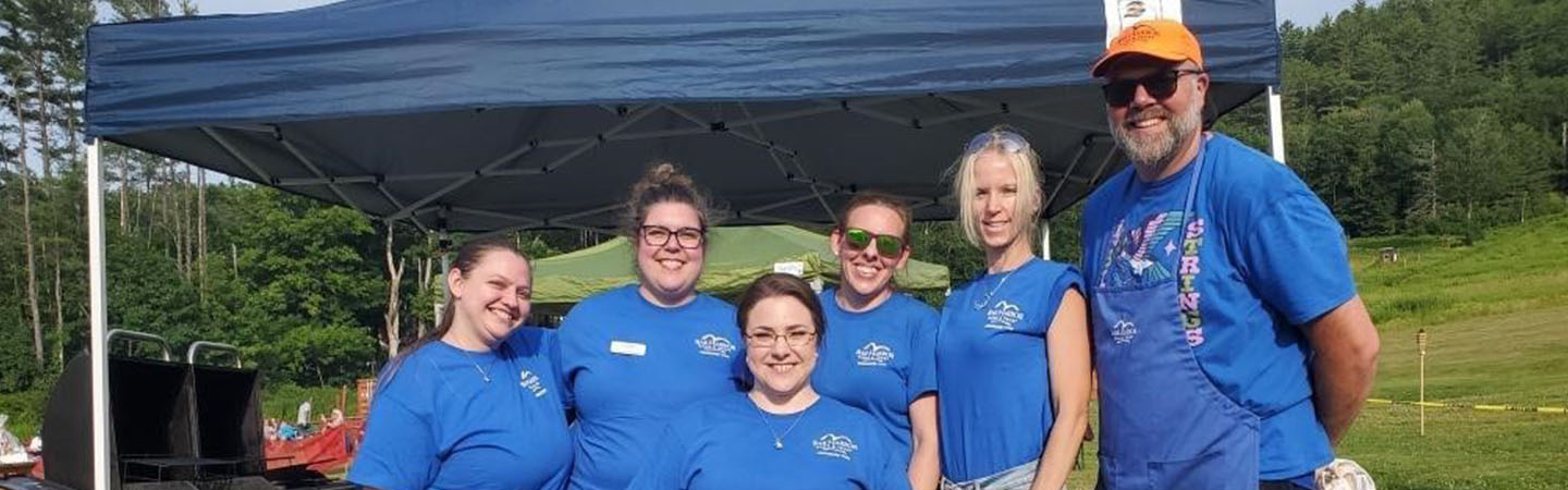 BHBT employees volunteer at an event
