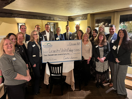 BHBT employees make a donation to Granite United Way