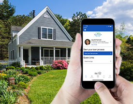 Image of hands holding a smartphone with the Bar Harbor Mortgage app in front of a house