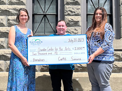 BHBT employees present a donation to Chandler Center for the Arts