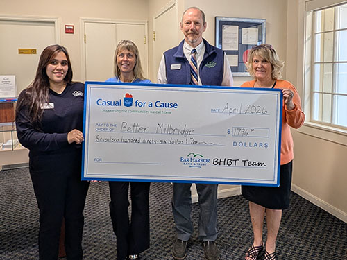 BHBT employees present a donation to Better Milbridge