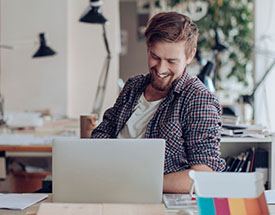 Man looking at a laptop computer