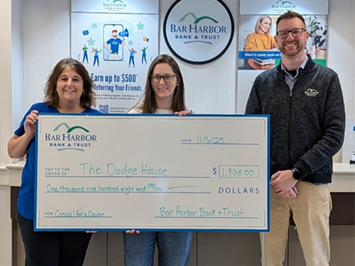 BHBT employees make a donation to The Dodge House